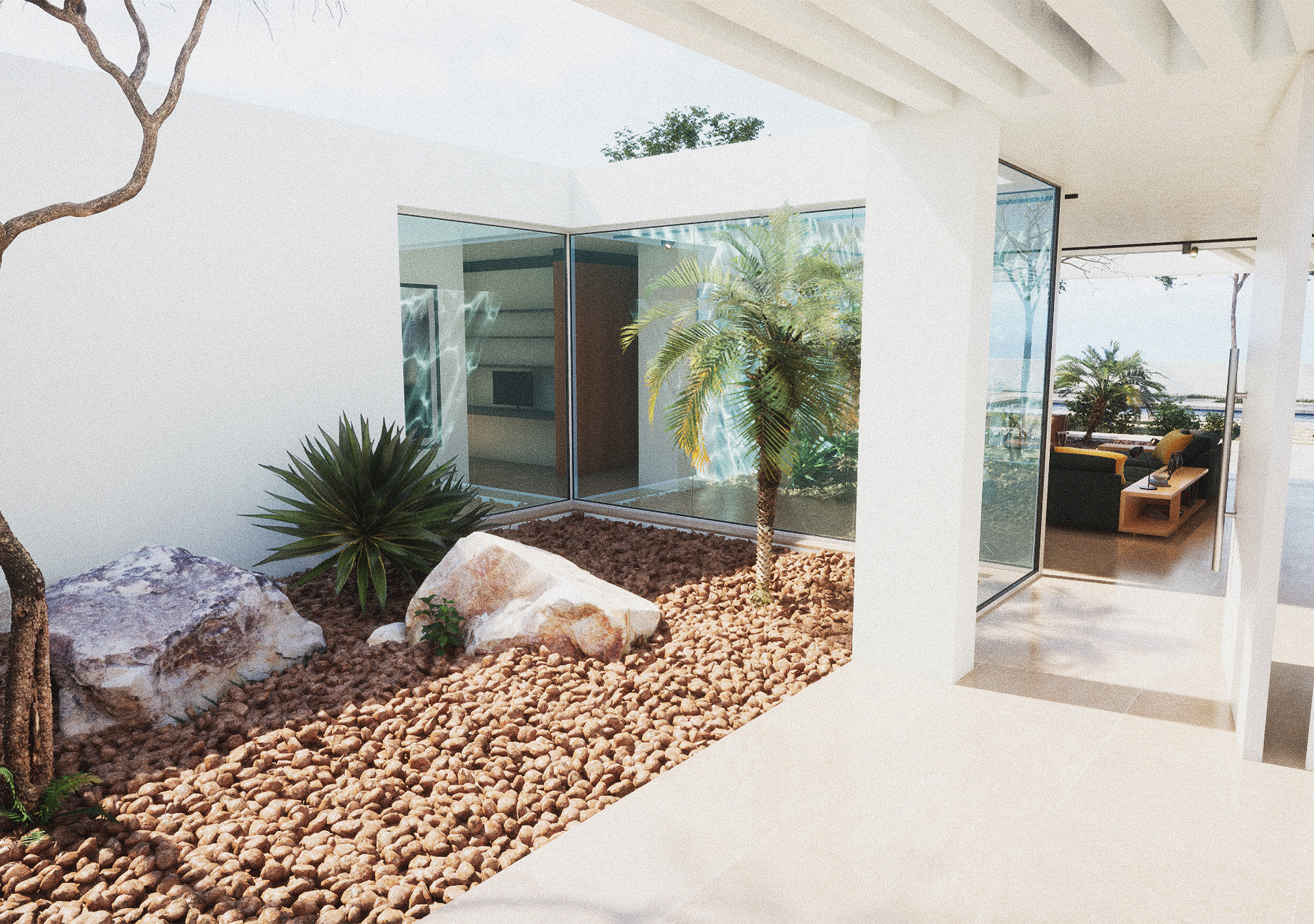 A wide-angle shot of a modern white villa featuring a large open-plan living area that flows onto a stone patio with a swimming pool and coastal vegetation.