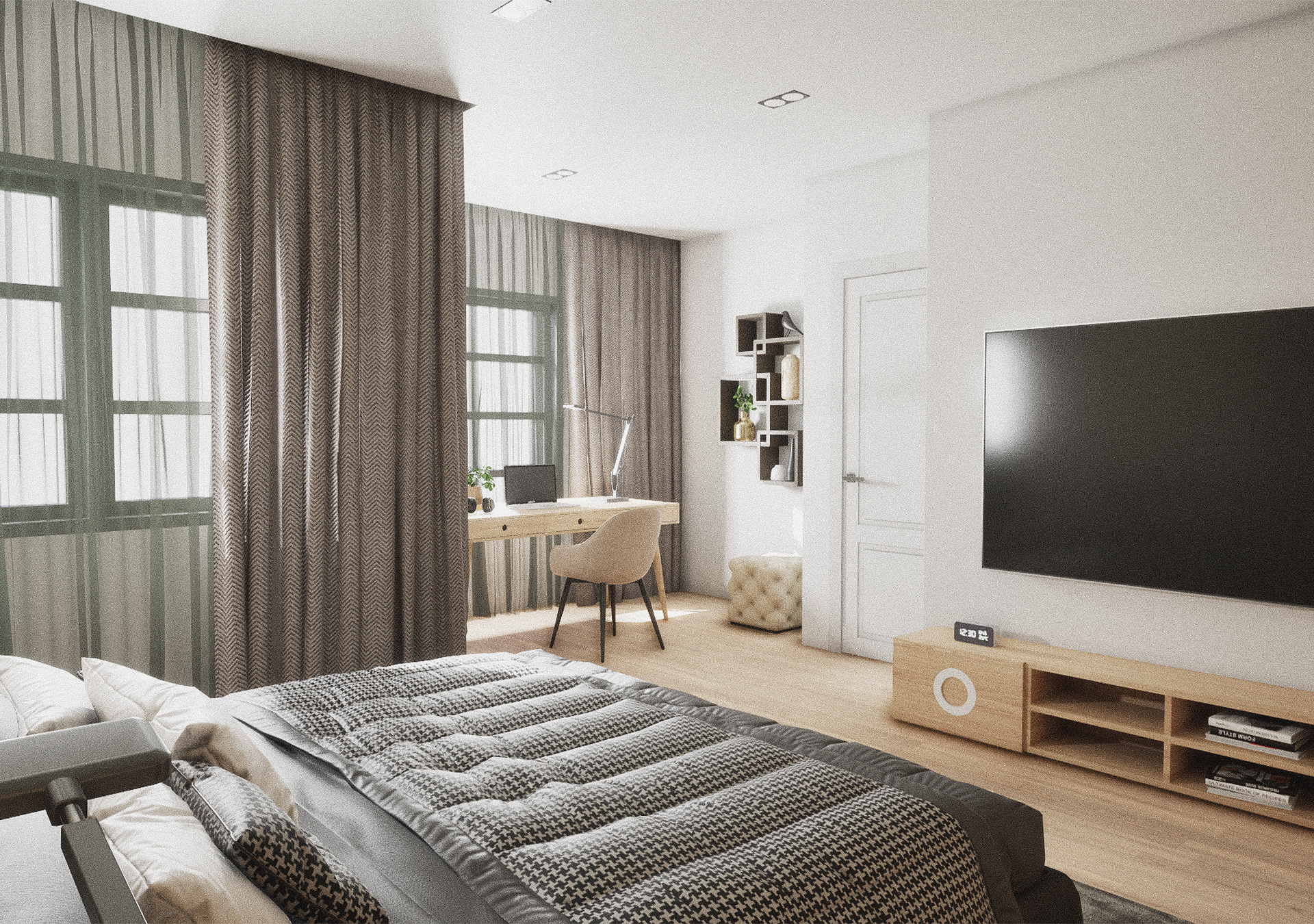 A bright, modern bedroom featuring a large TV mounted on a white wall, a light wood media console, and a desk area positioned by a window with long, patterned grey curtains.